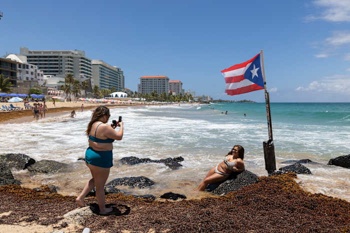 Hurricane Erin weakens to Category 3 as forecasters wait for northward turn