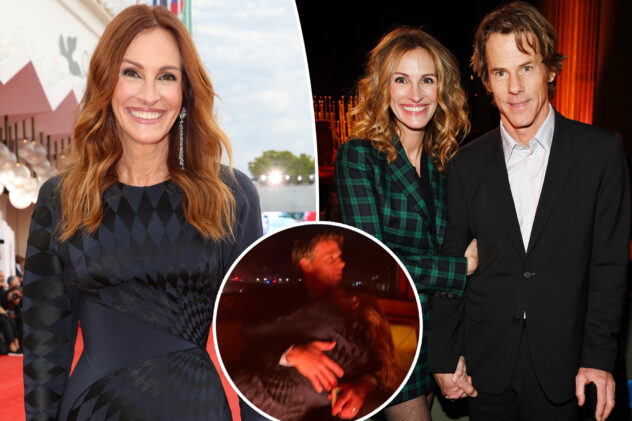 Julia Roberts cuddles up to husband Danny Moder on romantic water taxi date in Venice