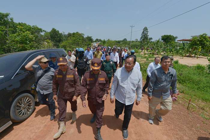 Thailand returns 2 wounded soldiers to Cambodia but continues to hold 18 of their comrades