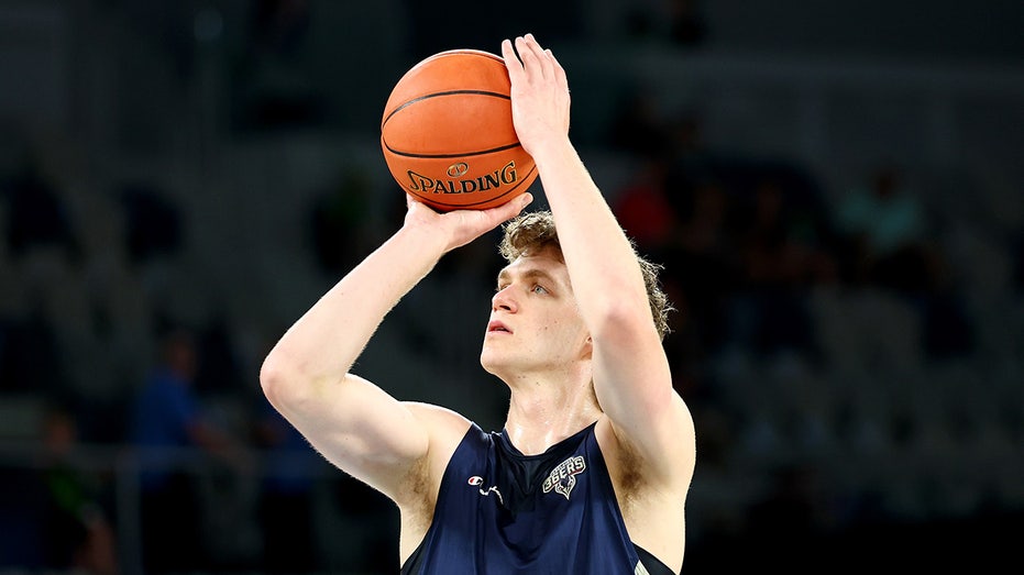 Australian basketball player fractures back after backboard crashes down during practice