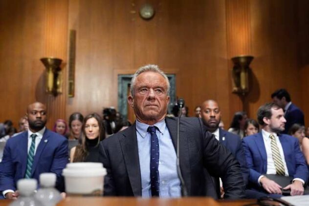 Kennedy tries to defend COVID-19 vaccine stance in raucous Senate hearing