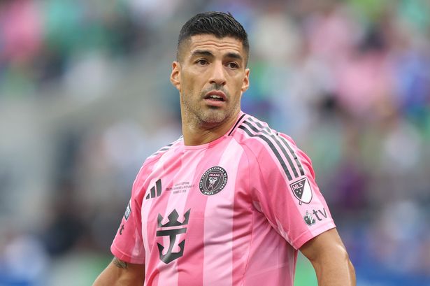 Liverpool legend Luis Suarez breaks silence with groveling apology after 'spitting' on rival coach