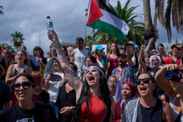 Strikes across Gaza kill at least 31 as international scholars accuse Israel of genocide