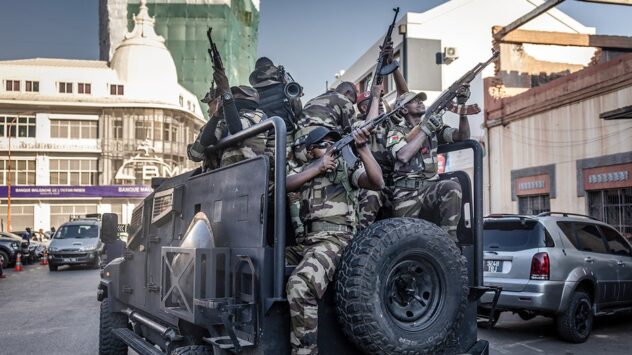 African island nation plunged into political chaos as president flees country, military seizes control