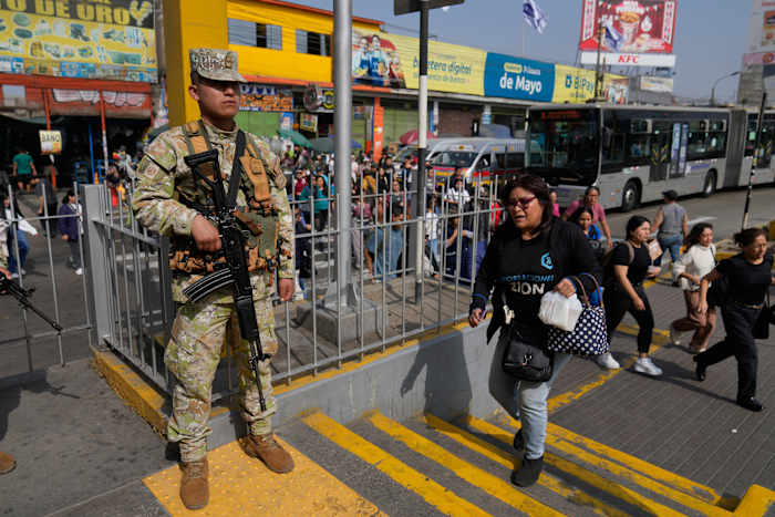 Military and police patrol streets of Peru’s capital as state of emergency begins