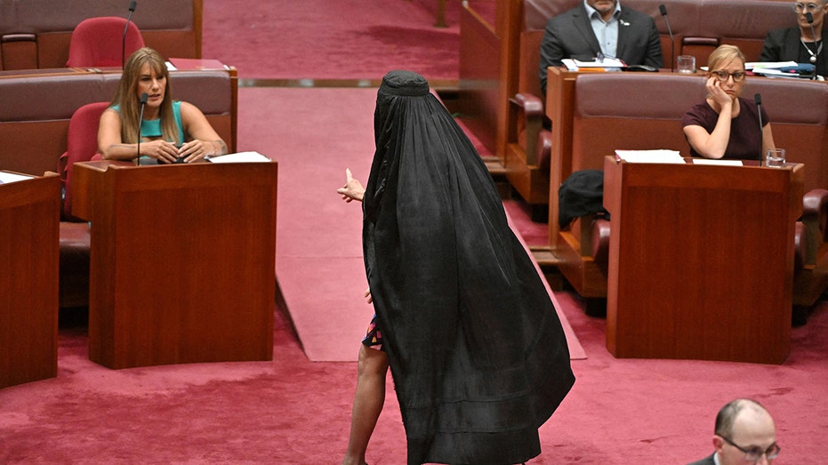 Australian senator wears burqa after move to block her face-covering ban bill