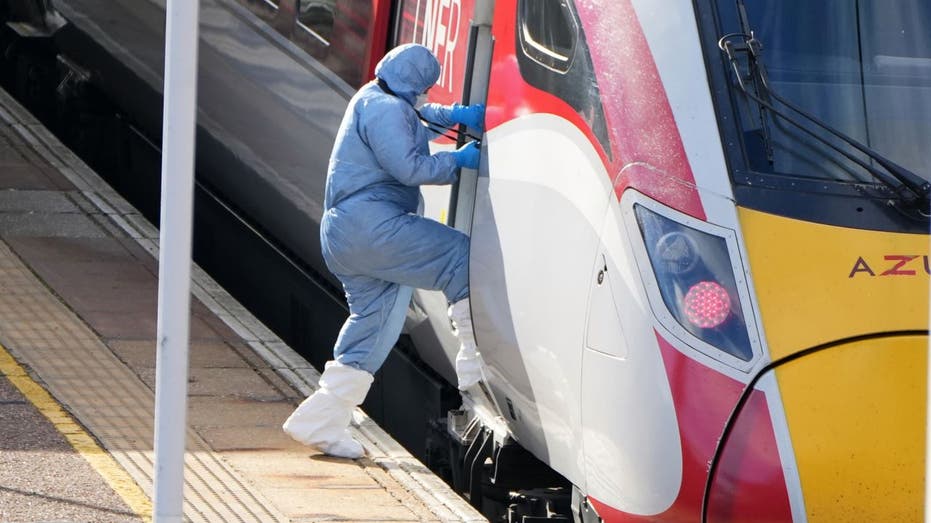 British police release details on suspects after 'shocking' train attack, update on victims