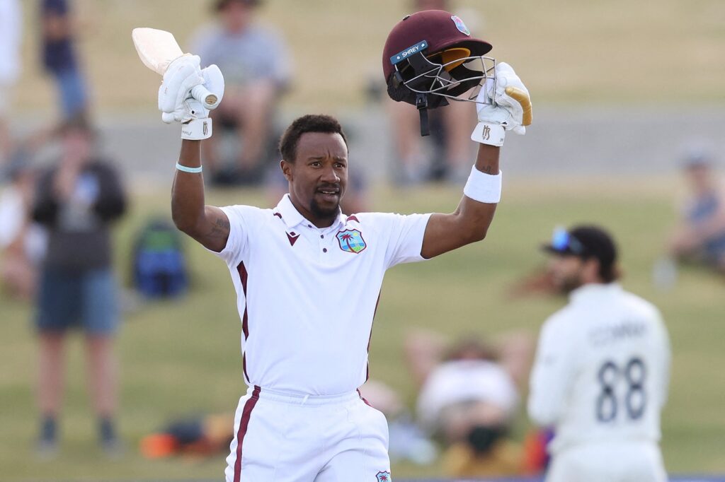 Hodge hundred keeps West Indies' fight on