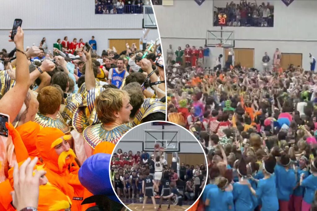 Taylor University basketball fans storm court as part of iconic ‘Silent Night’ tradition during 118-33 win