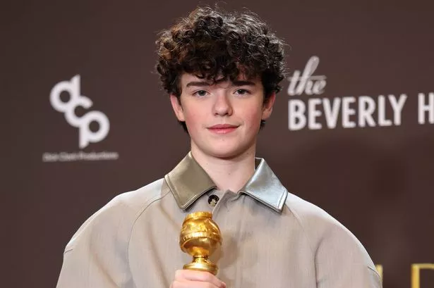 Linda Pizzuti Henry reacts after Owen Cooper names Liverpool at Golden Globes