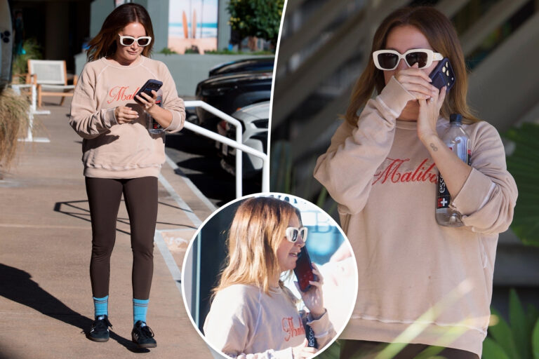 See photos of Ashley Tisdale’s somber phone conversation as ‘toxic’ mom group drama continues