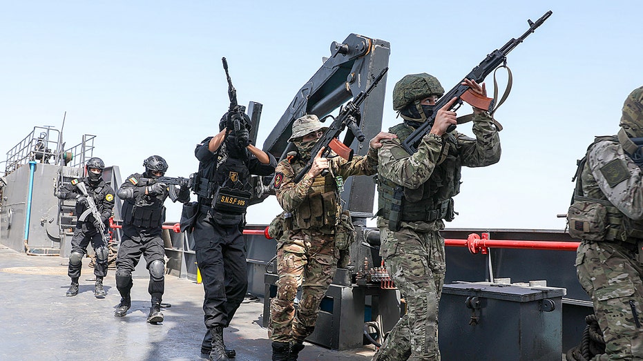 Iran covertly repositions strike drones amid Russia drills in Strait of Hormuz, expert says