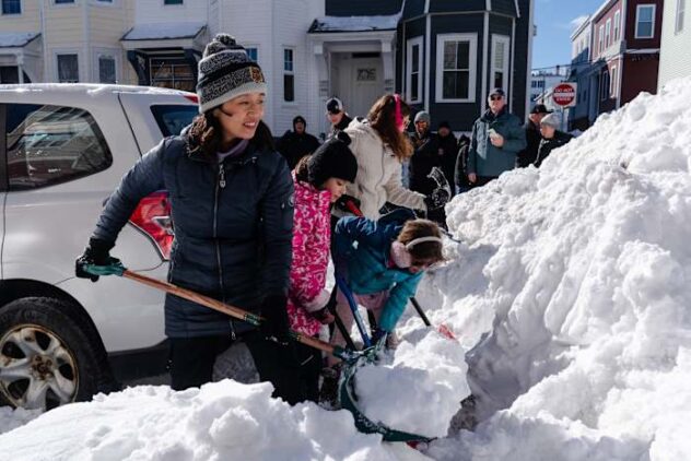 More snow falls on the Northeast US, where huge piles remain from the last storm