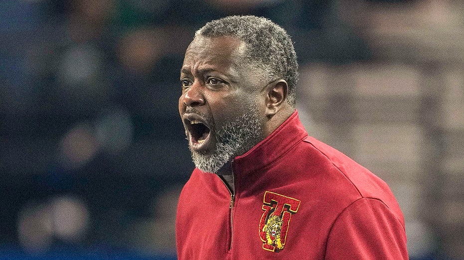 Tuskegee University basketball coach handcuffed on court during post-game incident at Morehouse College