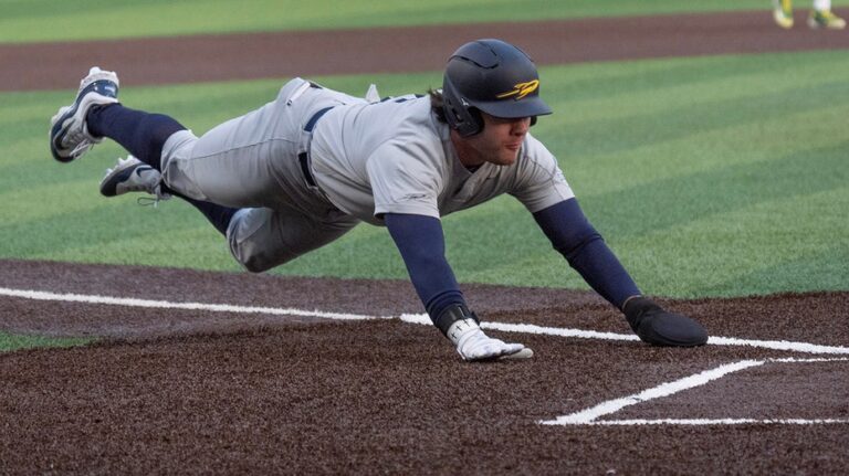 College baseball pitcher shoves runner on tag out, sparking benches to clear