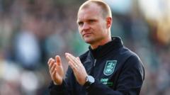 Huddersfield boss Manning takes compassionate leave