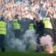 Police separate Celtic and Rangers fans after Ibrox pitch invasion