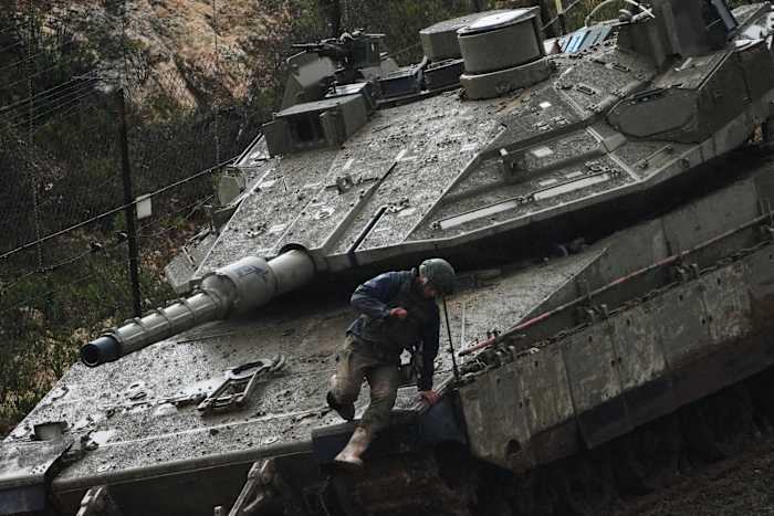 The Latest: Israel intensifying attacks, Iran shows defiance, nuclear site hit