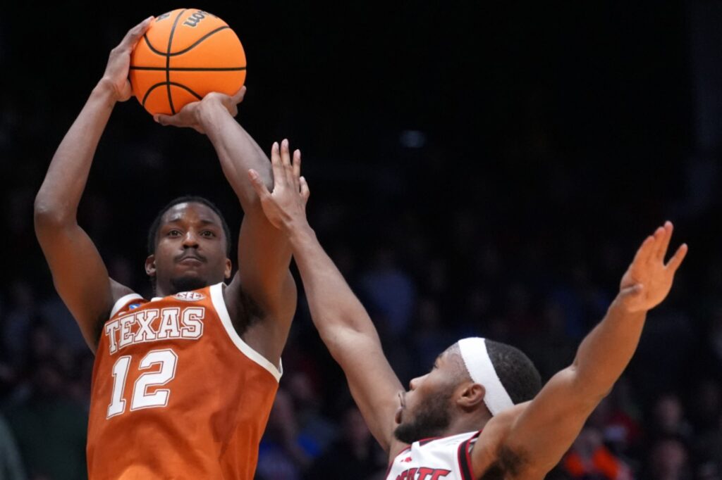 Tramon Mark’s jumper in final second sparks Texas’ First Four March Madness win over NC State