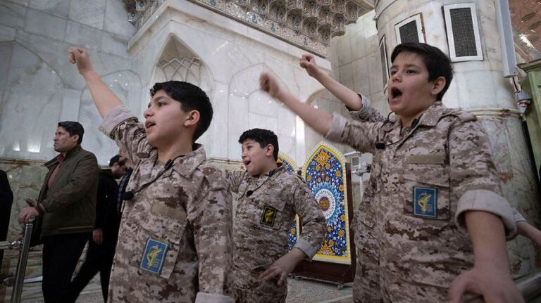 Iran Guards recruiting children as young as 12, putting them on front lines of war