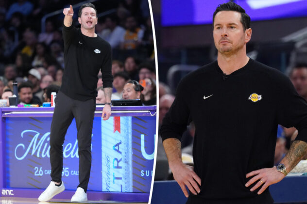 Lakers head coach J.J. Redick laces up custom made Nike sneakers for Autism Acceptance Month
