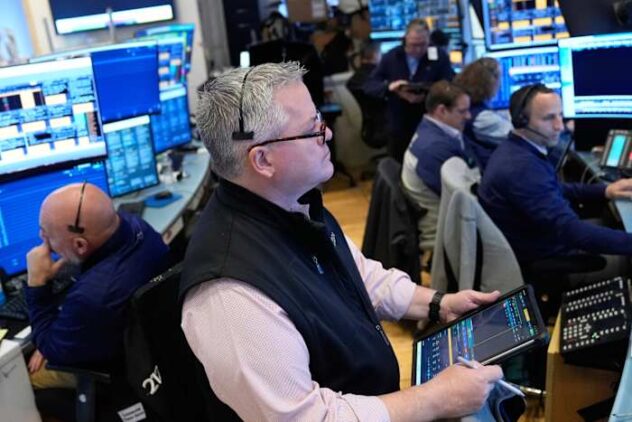 Oil prices drop 9% and Wall Street rallies to a record after Iran reopens the Strait of Hormuz