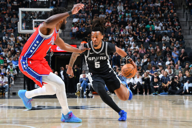 Spurs hold off 76ers for 60th win despite losing Wembanyama to rib injury