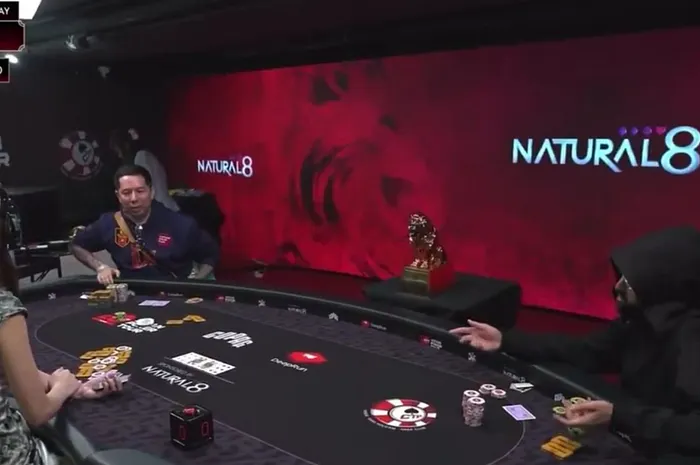 Accidental Genius: How a Fist-Bump Created the Perfect Poker Bluff