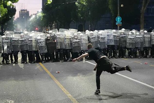 Protesters clash with police after an anti-government rally in Serbia's capital