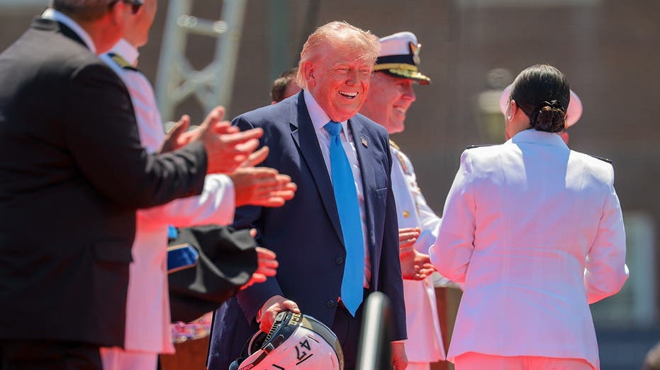 Trump honors two record-breaking athletes at US Coast Guard Academy graduation ceremony