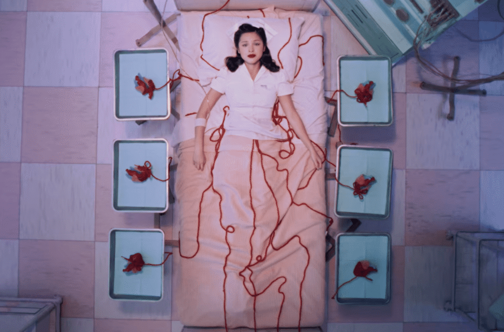 Watch Olivia Rodrigo Unravel in New “The Cure” Video