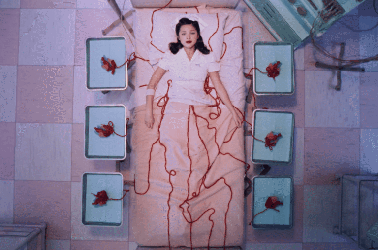 Watch Olivia Rodrigo Unravel in New “The Cure” Video