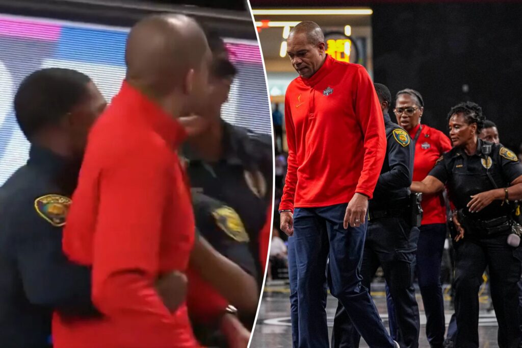 Cops escort Mystics coach Sydney Johnson off the court after losing it on refs in wild scene