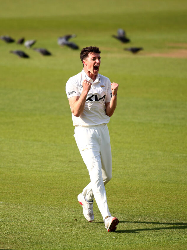 Fisher strikes between showers but weather frustrates Surrey