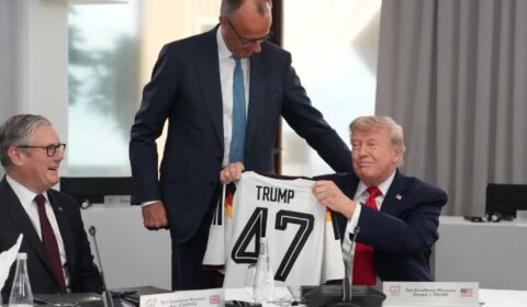 German Chancellor gives Trump a ‘TRUMP 47’ soccer jersey as belated birthday gift at G7 summit