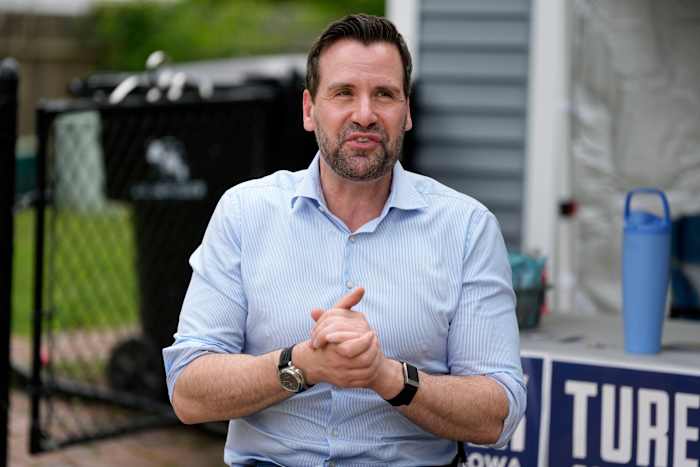 Iowa Democrats vote to settle a tense Senate primary as the party looks to flip GOP seats this fall