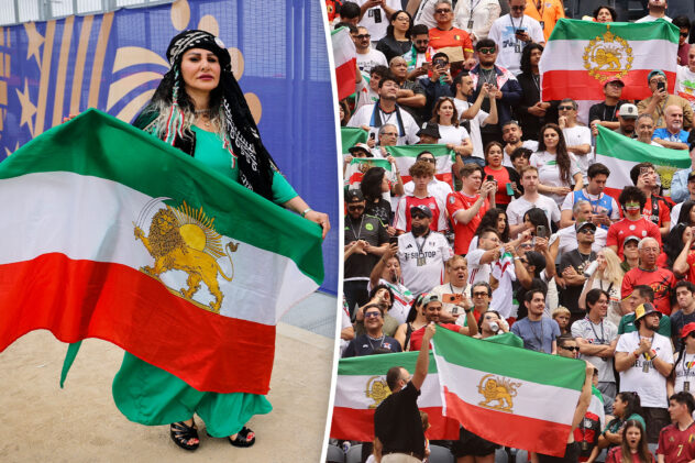 Iranian fans defy FIFA ban again as forbidden flags flood stadium during World Cup clash with Belgium