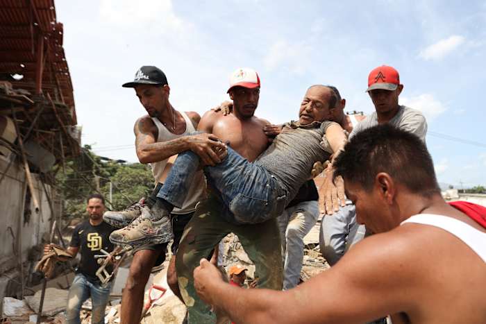 Neighbors dig through Venezuela rubble to search for loved ones after 2 deadly earthquakes