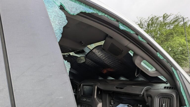 North Side hotel guests wake up to broken car windows, items stolen