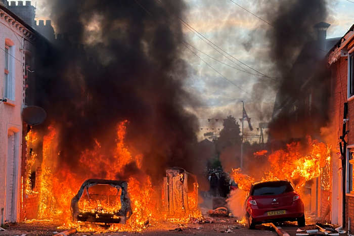 Police blast water cannons at Belfast protesters as unrest flares again after stabbing
