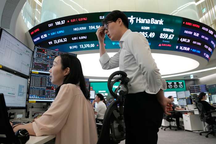 Asian markets retreat, with Korean shares slumping despite an AI-led rebound on Wall St