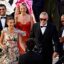 Erling Haaland leads party-goers in Norway's iconic rowing celebration as he joins Man City stars at team-mate's glamorous Italian wedding