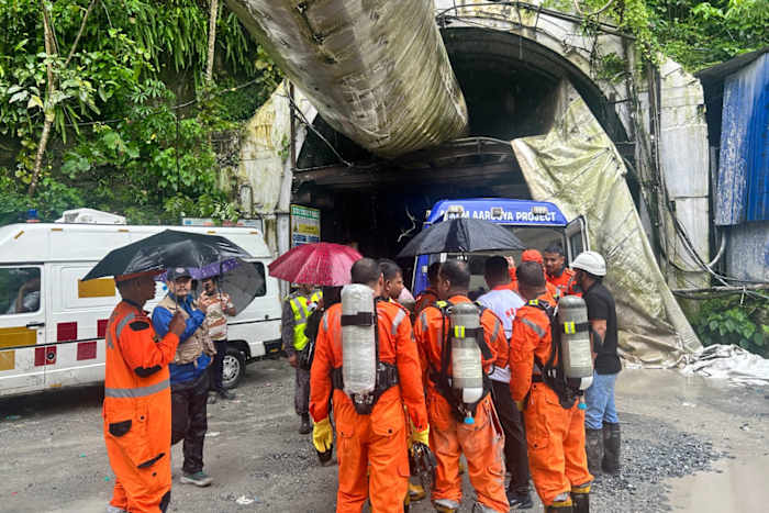 Toxic gas slows efforts to rescue 13 workers trapped in India hydropower tunnel