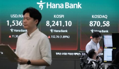 US futures rise and Asian shares trade mixed as oil prices decline with increased output