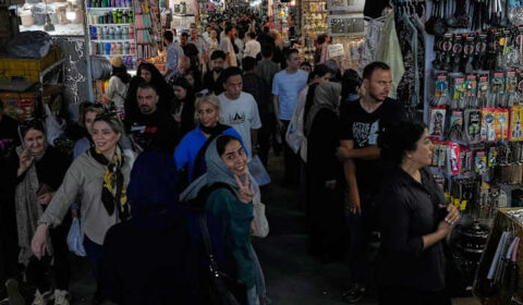 US strikes bridges and collapses a tower at a key port as its Iran campaign expands