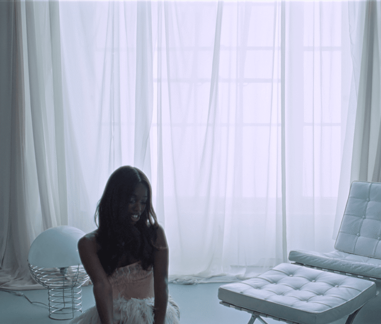 Watch John Glacier Live Out Her 007 Fantasies in New “Bond Girl” Video