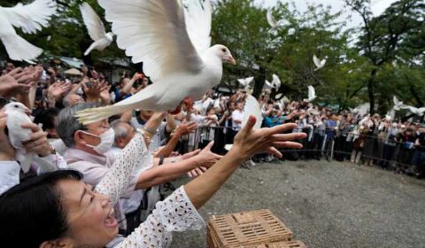 Japan’s defense chief visits shrine neighbors see as symbol of Japanese militarism
