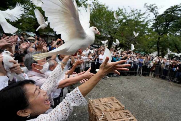 Japan's defense chief visits shrine neighbors see as symbol of Japanese militarism