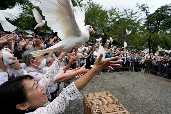 Japan's defense chief visits shrine neighbors see as symbol of Japanese militarism