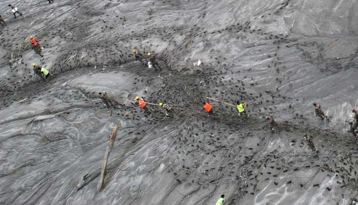 2 trapped workers rescued alive from a tunnel in Nepal, officials say